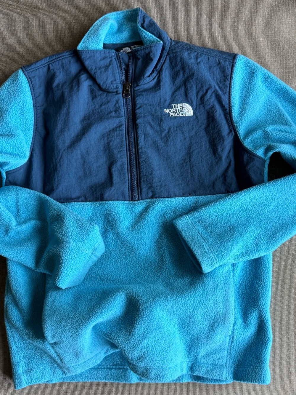 The North Face 1/4 Zip Youth Fleece Jacket.